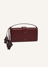 Load image into Gallery viewer, Apolonia bag in burgundy leather with flower charm