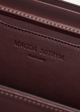 Load image into Gallery viewer, Apolonia bag in burgundy leather with flower charm