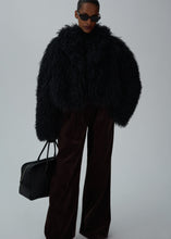 Load image into Gallery viewer, Short shag shearling coat in black
