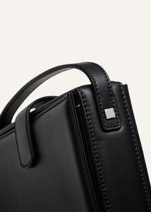 Apolonia bag in black leather with flower charm