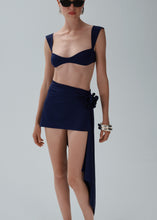 Load image into Gallery viewer, Asymmetrical draped swim skirt in navy
