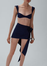 Load image into Gallery viewer, Asymmetrical draped swim skirt in navy
