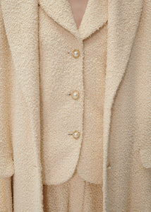 Single breasted long coat in beige bouclé
