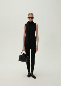 Sleeveless high neck knit top in black