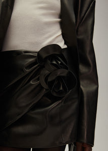 Draped leather mini skirt in black