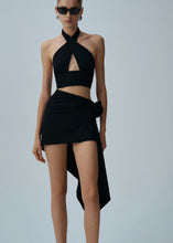 Load image into Gallery viewer, Asymmetrical draped swim skirt in black
