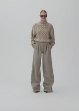 Load and play video in Gallery viewer, Cashmere cable turtleneck sweater in camel
