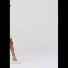 Load and play video in Gallery viewer, Feather crochet mini skirt in cream
