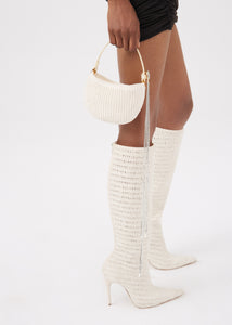 Tall pointed toe boots in cream crochet fabric
